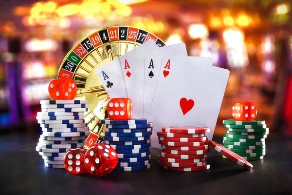 Live casino dealer at blackjack table with multiple camera angles